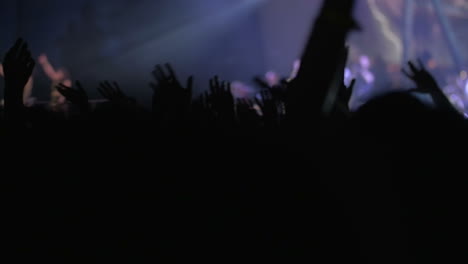 Fans-waving-hands-on-concert