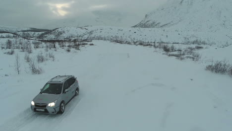 Car-Driving-through-the-Field-in-Winter
