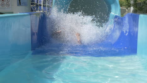 Woman-going-down-water-slide