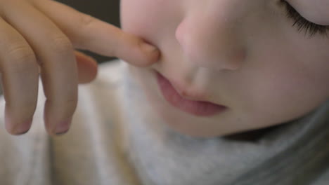 Child-sneezing-close-up
