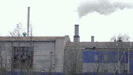 Old-abandoned-factory-with-working-chimney