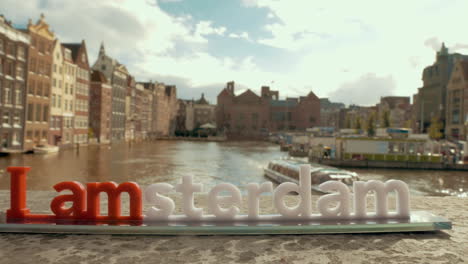 Waterside-city-view-and-Amsterdam-slogan