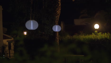 House-yard-with-Chinese-lanterns-at-night