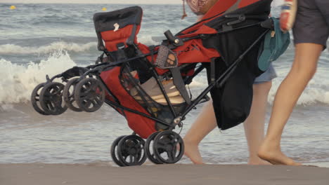 Rolling-the-stroller-along-the-seashore