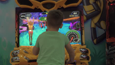 Child-having-fun-with-motorbike-racing-simulator