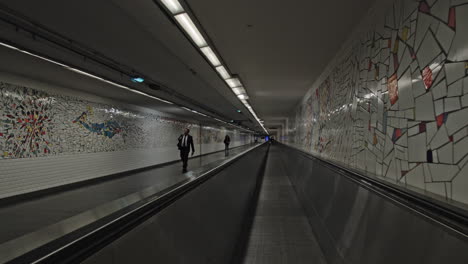 Timelapse-of-moving-through-subway-tunnel-by-flat-escalator-Paris-France