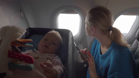 Baby-in-a-cot-on-an-airplane