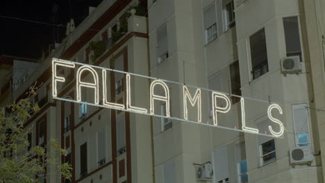 Night-view-of-illuminated-banner-in-celebration-of-Las-Fallas-Valencia