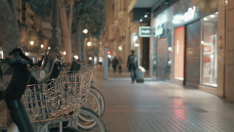 Bikes-for-share-in-the-street-of-night-city