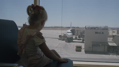 Watching-planes-makes-her-waiting-more-interesting