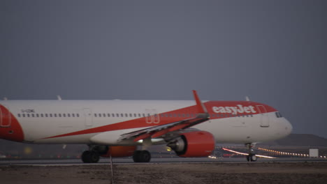 Airplane-of-EasyJet-at-the-airport-in-the-evening