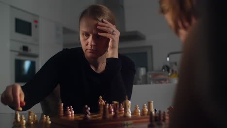 Mother-and-Her-Son-Compete-in-a-Game-of-Chess