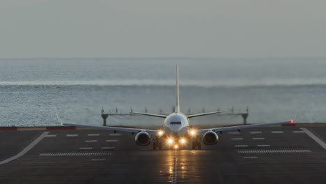 Commercial-jet-airplane-taking-off-runway