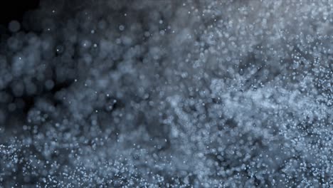 Colored-Powder-Scatters-on-a-Black-Isolated-Background-Sand-Spray-Blue-Color-Slow-Motion-3d