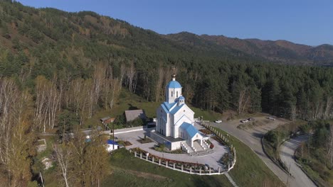 Aerial-view-of-church-in-forest