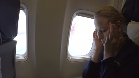 Woman-in-the-plane-feeling-sick