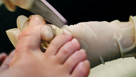 Female-feet-during-filing