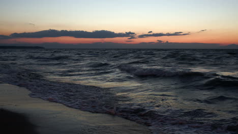 Scene-of-strong-sea-surf-at-sunset