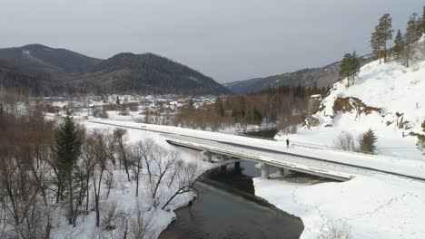 Aerial-Winter-Landscape-with-Majestic-Bridge