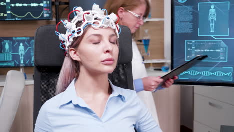 Female-patient-keeping-her-eyes-closed-in-a-brain-research-centre
