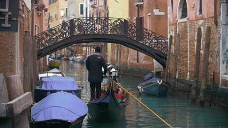 Traveling-by-gondola-on-Venice-canal