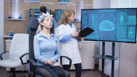 Female-patient-with-eyes-closed-wearing-brainwaves-scaning-headset