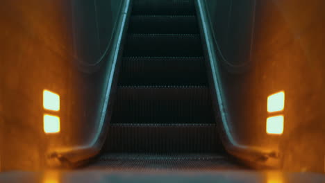 Illuminated-escalator-moving-up