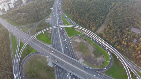 Flying-over-city-traffic-on-transport-intersection