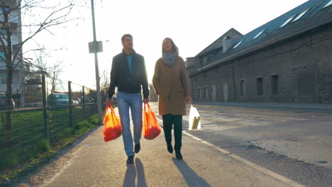 Happy-Family-Going-Home-With-Grocery-Bags