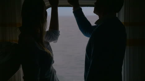 Couple-Looking-Out-the-Ferry-Window