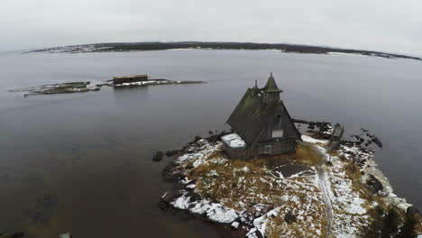 Aerial-view-of-old-house-on-winter-coast
