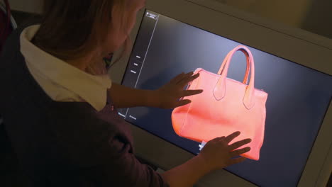 3D-Modell-Einer-Tasche-Auf-Einem-Touchscreen-Monitor