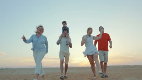 Enjoable-family-walk-on-the-beach