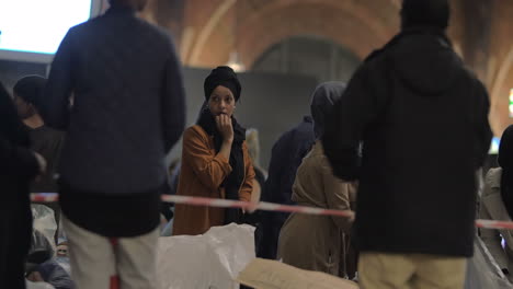 Female-Syrian-Refugees-at-Charity-Collecting-Point-in-Copenhagen-Railroad-Station