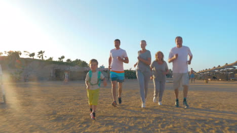 Sportive-family-running-on-the-beach