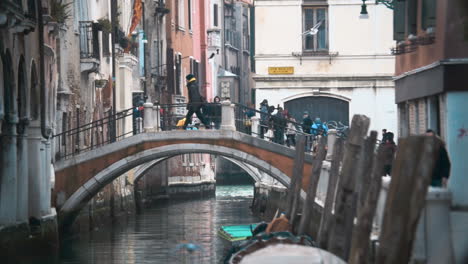 Venetian-cityscape-with-bridge-and-old-houses