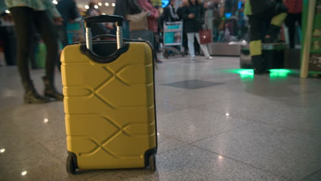 Yellow-Trolley-Bag-in-Airport-or-Railway-Station