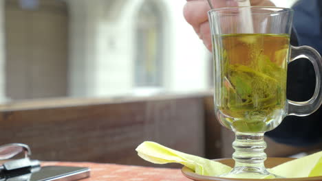 Stir-Sugar-In-Green-Tea