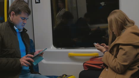 Passengers-of-Stockholm-Subway-with-Gadgets