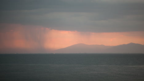 Timelapse-of-pouring-rain-over-the-sea