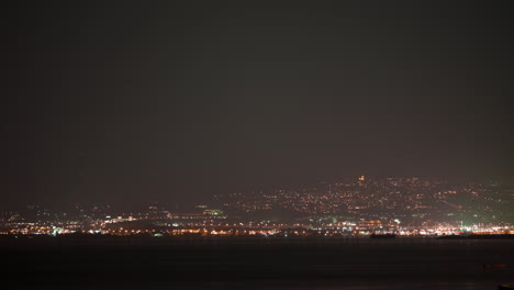 Timelapse-of-night-getting-to-the-coastal-city