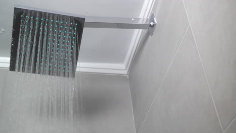 Hot-Water-Flowing-from-Square-Shower-Head