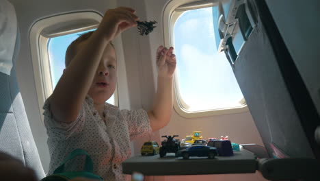 Child-playing-with-toys-during-the-flight