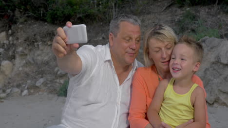 Grandparents-Taking-Selfie-Shot-with-Grandson