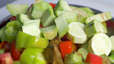 Adding-cut-vegetables-in-salad