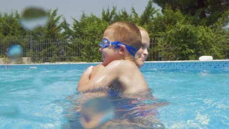 Mother-and-Son-Having-Fun-in-Home-Pool