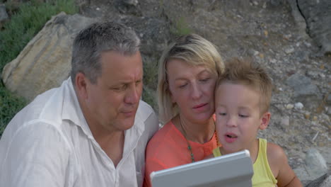 Boy-and-His-Grandparents-with-Tablet
