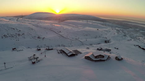 Flying-over-the-ski-centre-area-at-sunset