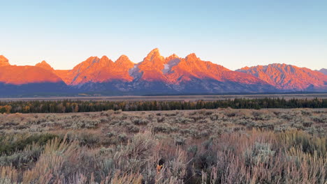 Grand-Teton-Nationalpark-HDR-Erstes-Licht-Morgen-Sonnenaufgang-Sonnenuntergang-Rosa-Rote-Gipfel-Jackson-Hole-Wyoming-Willow-Elk-Ranch-Flats-Fotograf-Traum-Schöner-Filmischer-Schieberegler-Rechte-Bewegung