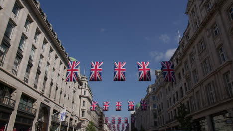 Union-British-Flags-Over-Street-Scene-In-Regent-Street-In-London,-England,-United-Kingdom